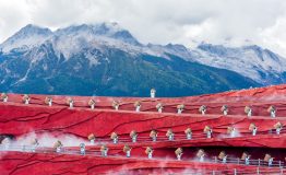 LIJIANG, CHINA - October 16 2019: Impression Lijiang is a magnificent outdoor singing and dancing performance demonstrating the tradition of the local ethnic people